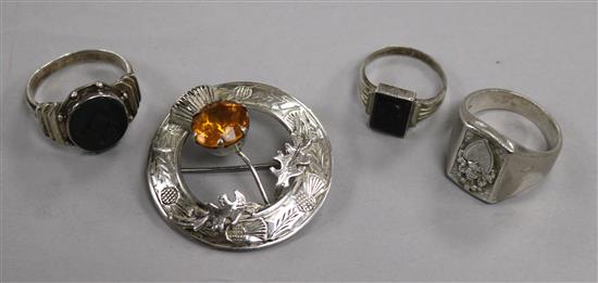 A masonic bloodstone matrix ring, a cameo ring, a Scottish cloak brooch and another ring.